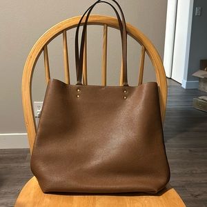 coach large tote, cavier, caramel color. Lightly used